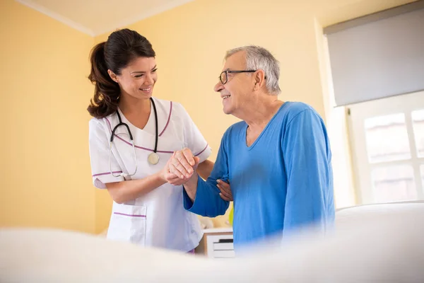 Female Doctor Nursing Home Facility Holding Her Patient Hand Assisting — Stock Photo, Image