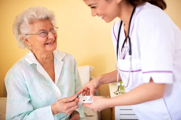 Skilled Nursing Facility Doctor Explaining Senior Woman Occupant Which Medications — Stock Photo, Image