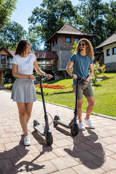 Lovely Couple Having Fun Try Riding Scooters Electric Power Scooter — Stock Photo, Image