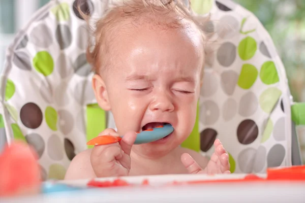 Angry disobedient baby child will not eat, feeding problems — Stock Photo, Image