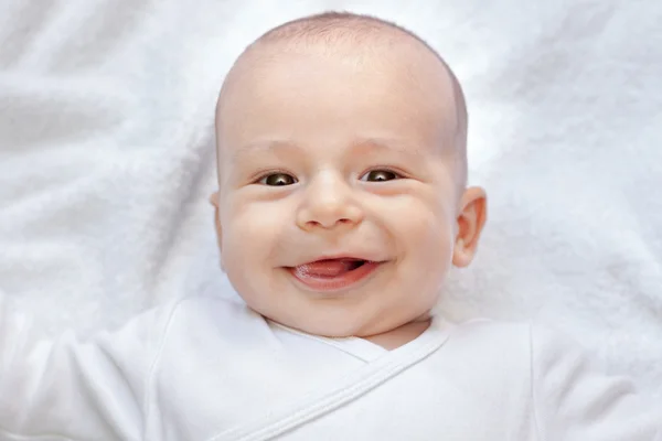 Lächelnd süßes schönes Baby — Stockfoto