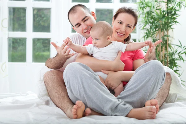 Adorable beautiful happy family — Stock Photo, Image