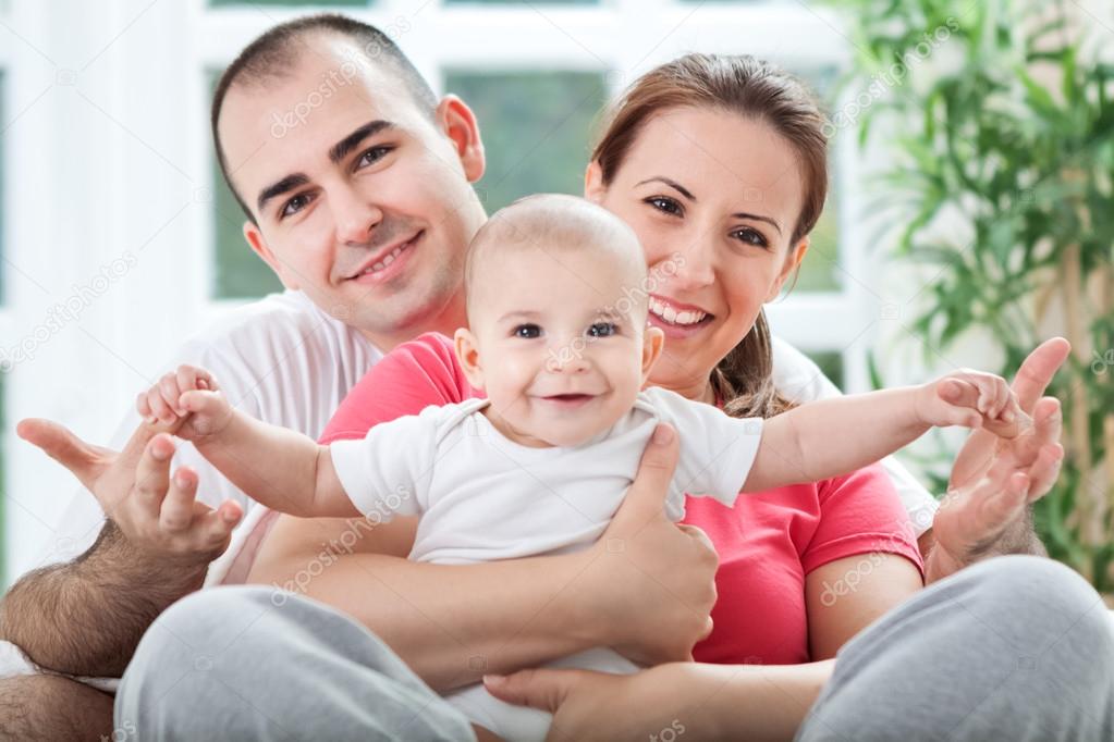 Beautiful smiling happy family enjoy at home