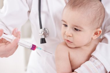Doctor does injection child vaccination clipart