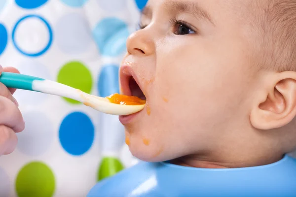 Bite of very hungry baby child — Stock Photo, Image