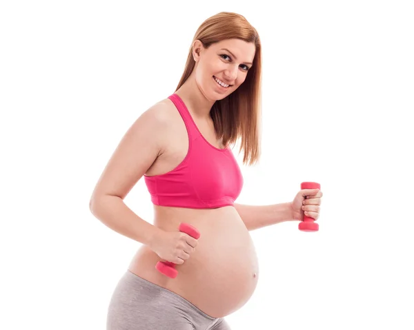 Sorridente felice bella donna incinta esercizio — Foto Stock