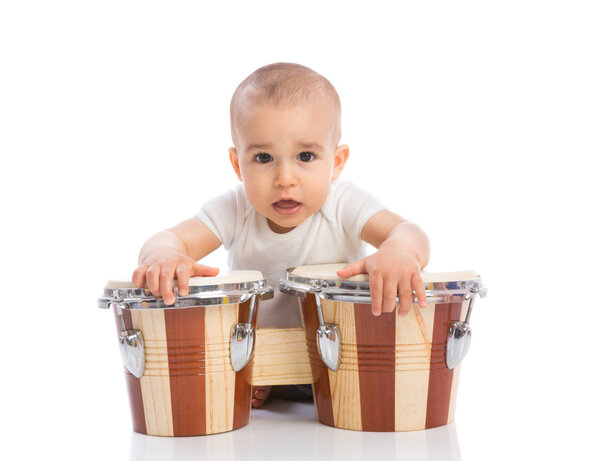 Funny smiling baby with bongos