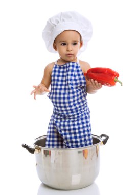 Güzel çocuk Şef tencerede sebze holding