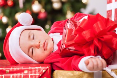 Bebek Uyku Noel Baba üzerinde dinlenme sunar