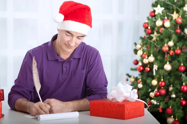 Man writes wishes — Stock Photo, Image