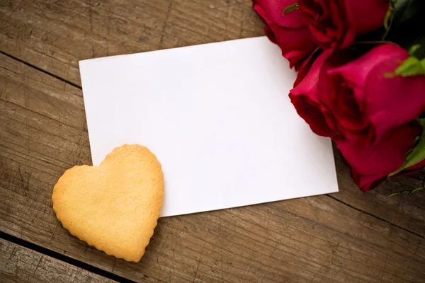 Blank notepad for copy space and vintage handmaded cookie — Stock Photo, Image