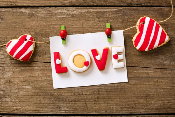 Love cookies on wooden background — Stock Photo, Image