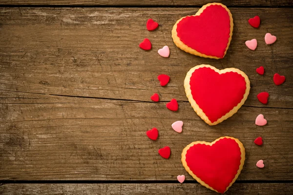 Cookies hearts on old wood background — Stock Photo, Image