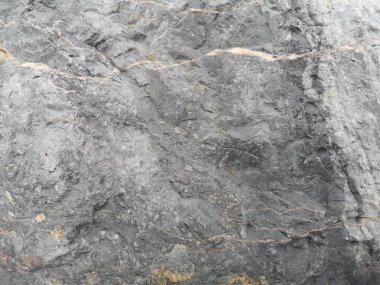 Doğal siyah kayrak taşı arkaplan şablonu, yüzey kaba dokusu kaya malzeme yapısı, Üst görünüm metin için boşluk kopyalama