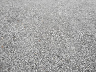 Çakıl taşlarıyla soyut bir arka plan. Küçük yuvarlak deniz taşları. Plaj kayaları.