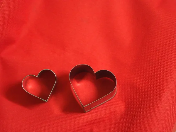 Bread Molds Stainless Heart Shaped Fabric Red Background Love Valentine Stock Image