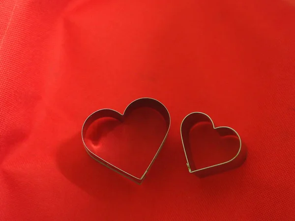 Couple Bread Molds Stainless Heart Shaped Fabric Red Background Love Stock Photo
