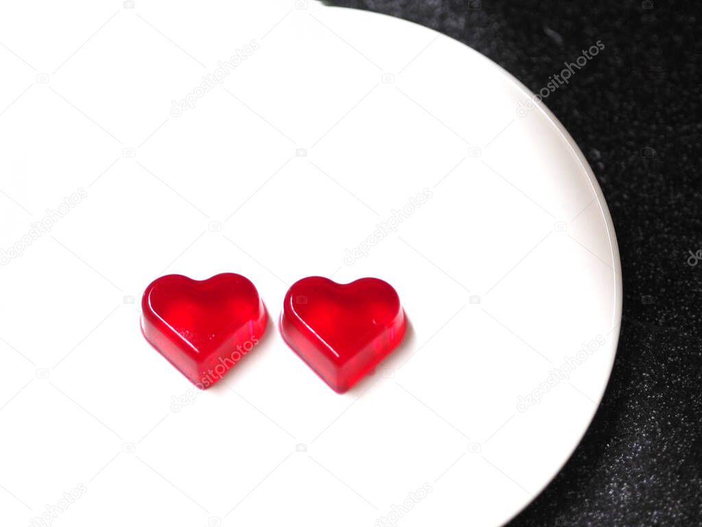 bread molds stainless Heart shaped on jelly red, love Valentine Day space for copy text card, sweet food