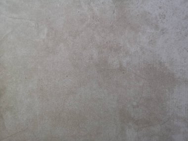 Çimento duvarındaki çatlak parlak kahverengi renk ve pürüzsüz yüzey dokusu beton malzeme vintage arka plan mimarı tuğla duvarlar sıvanmış ve boyanmış.