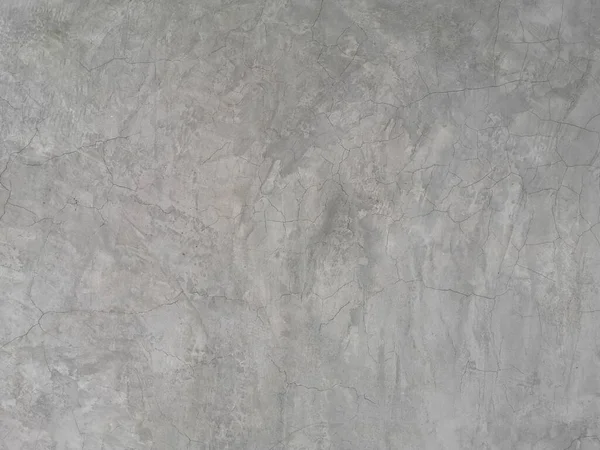 Çimento duvarındaki çatlak parlak gri renkler ve pürüzsüz yüzey dokusu beton malzeme vintage arka plan mimarı tuğla duvarlar sıva ve boyalı