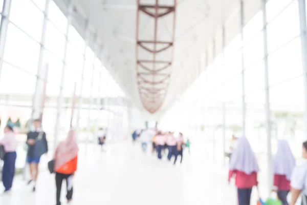 Blur modern first floor hall background. airport, clinic clinical showroom merge inside blurry corridor clinical light health healthcare glow backdrop blue center dynamic finance school atrium public