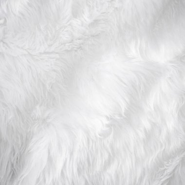 Yakından bakıldığında beyaz yünlü koyun arka planı hafif doğal detay, gri tüysüz pamuklu doku. Kırışık kuzu derisi, kilim hasırı, yün yün kumaş konsepti. 