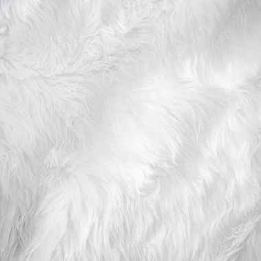 Yakından bakıldığında beyaz yünlü koyun arka planı hafif doğal detay, gri tüysüz pamuklu doku. Kırışık kuzu derisi, kilim hasırı, yün yün kumaş konsepti. 
