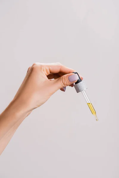 Cropped View Woman Holding Pipette Oil Isolated Grey — Stock Photo, Image