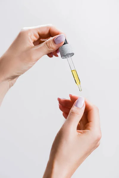 Cropped View Woman Applying Oil Pipette Fingernails Isolated Grey — Stock Photo, Image