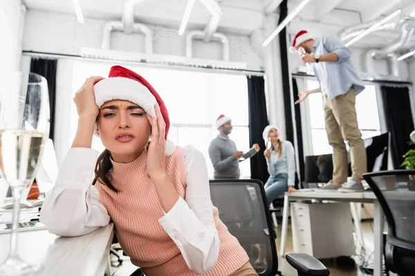 Drunk Businesswoman Santa Hat Looking Camera Glass Champagne Colleagues Blurred — Stock Photo, Image