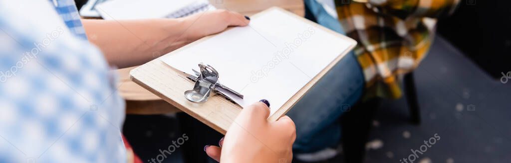 Partial view of waiter holding clipboard with invoice near client, banner — Stock Image Partial View Waiter Holding Clipboard Invoice Client Banner Royalty Free Stock Photos