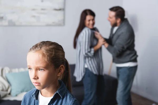 Upset Kid Standing Parents Quarreling Blurred Background Home — Stock Photo, Image