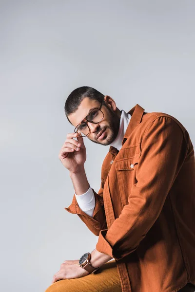 Fashionable Man Holding Eyeglasses Looking Camera Isolated Grey — Stock Photo, Image