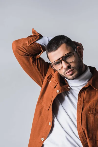 Bearded Man Eyeglasses Terracotta Jacket Posing Camera Isolated Grey — Stock Photo, Image