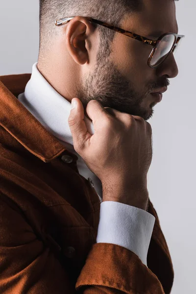 Young Man Eyeglasses Adjusting Collar White Turtleneck Isolated Grey — Stock Photo, Image