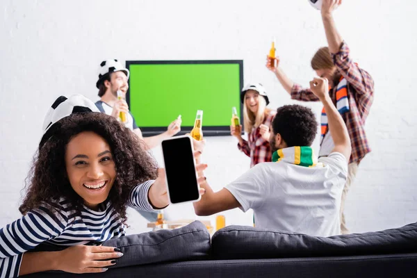 Cheerful African American Woman Showing Smartphone Blank Screen Multicultural Friends — Stock Photo, Image