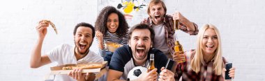 excited multicultural friends shouting while watching football championship with pizza and beer, banner clipart