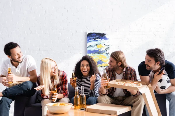 Excited African American Woman Pointing Finger Holding Beer While Watching — Stock Photo, Image