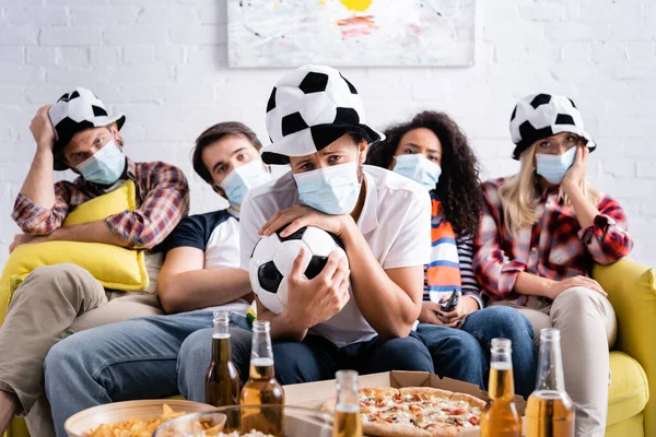 Upset Man Football Fan Hat Holding Soccer Ball Sad Multiethnic — Stock Photo, Image