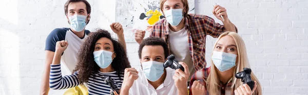 Kyiv Ukraine October 2020 Excited Multiethnic Friends Medical Masks Holding — Stock Photo, Image