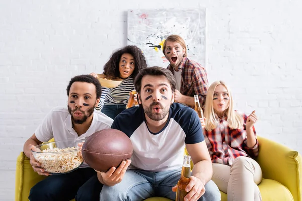 Shocked Multicultural Friends Painted Faces Watching Rugby Championship Home — Stock Photo, Image