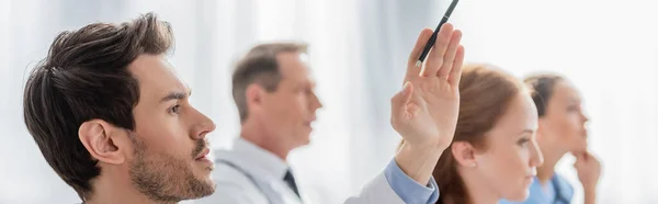 Doctor Raised Hand Multicultural Colleagues Meeting Hospital Blurred Background Banner — Stock Photo, Image