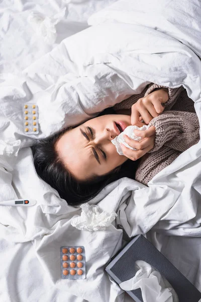 Top View Sick Young Brunette Woman Tissue Pills Thermometer Bed — Stock Photo, Image