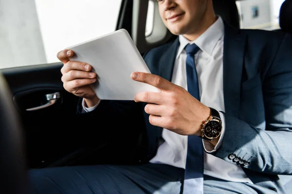 Cropped View Digital Tablet Hands Businessman Blurred Background Car — Stock Photo, Image