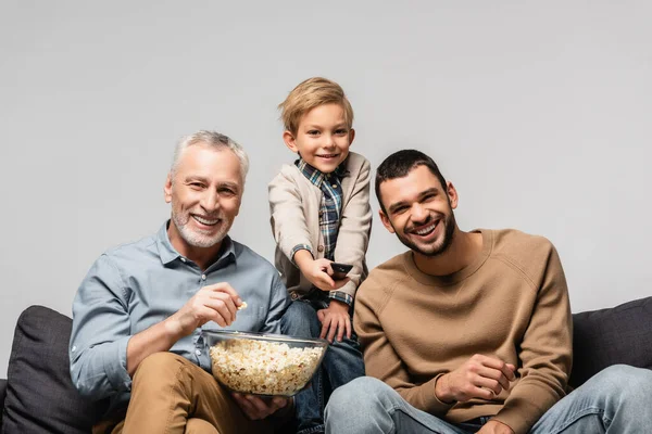 Cheerful Boy Holding Remote Controller Happy Grandfather Dad Watching Popcorn — Stock Photo, Image