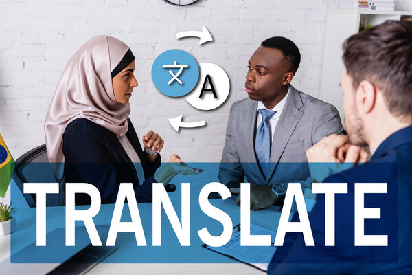 arabian businesswoman pointing with hand while talking to multicultural business partners, translate word near icons with arrows illustration