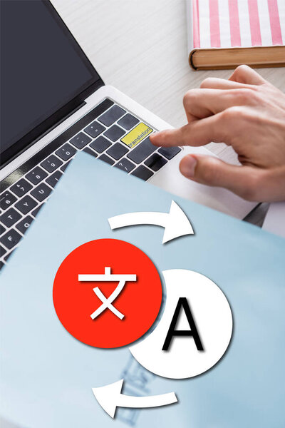 cropped view of translator pressing key with translation lettering, icons with arrows illustration