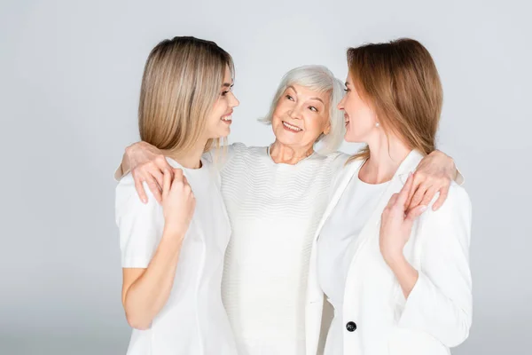 Three Generation Cheerful Women Smiling While Hugging Isolated Grey — Stock Photo, Image