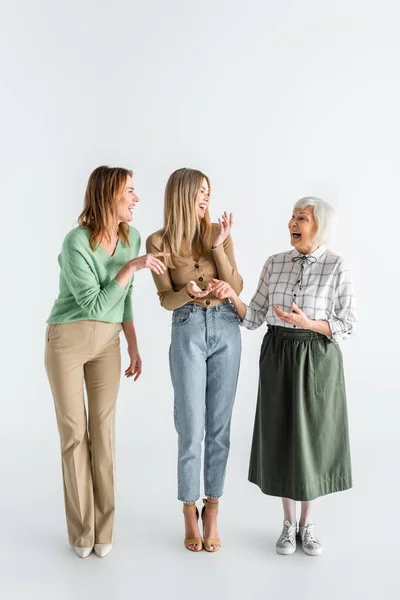 Full Length Three Generation Happy Women Laughing While Standing White — Stock Photo, Image