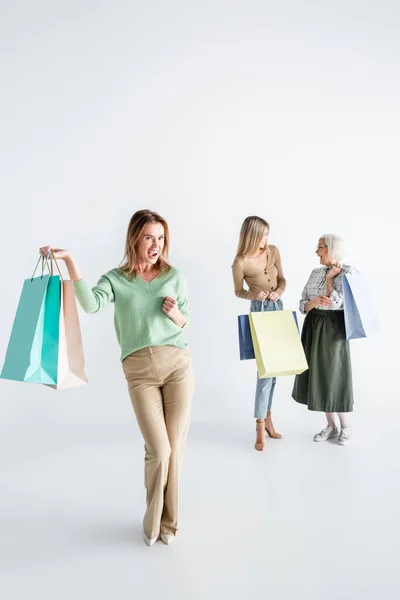 Full Length Happy Woman Shopping Bags Daughter Senior Mother Blurred — Stock Photo, Image